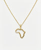Gold necklace with a pendant shaped like the African continent on a white background